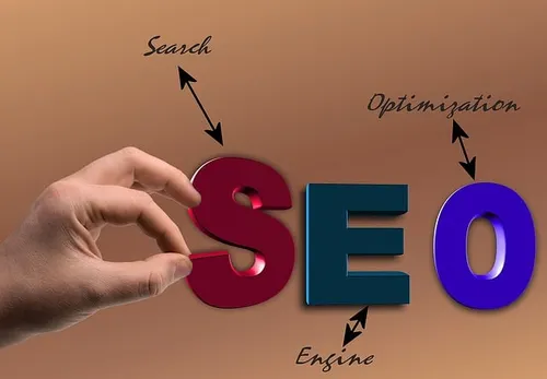 The letters SEO being assembled by hand, annotated Search, Engine and Optimization